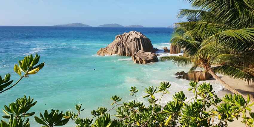 Seychelles in July offers couples pristine beaches, crystal-clear waters, romantic sunsets, island hopping, and secluded luxury resorts for an unforgettable getaway.