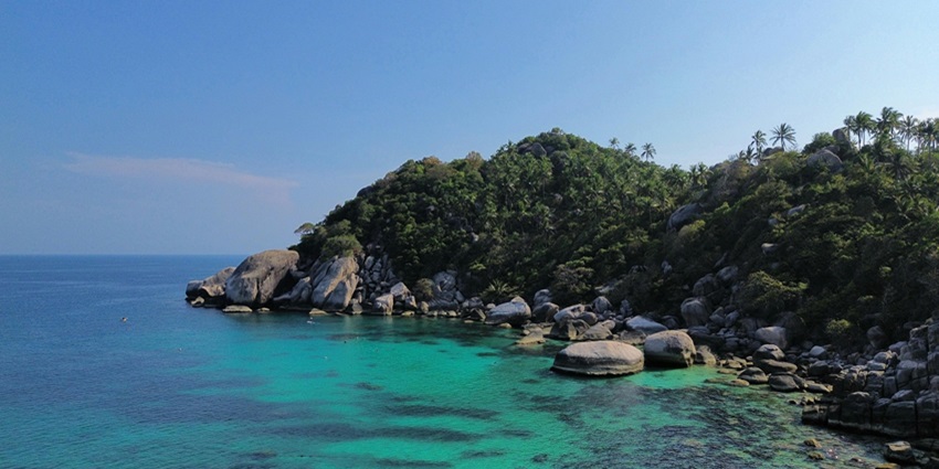 Dive into clear waters of Shark Island, a top snorkelling destination in Koh Tao Island