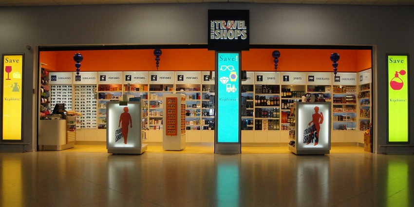 Hellenic Duty-Free Shop in Athens Airport is displaying goods and serving visitors.