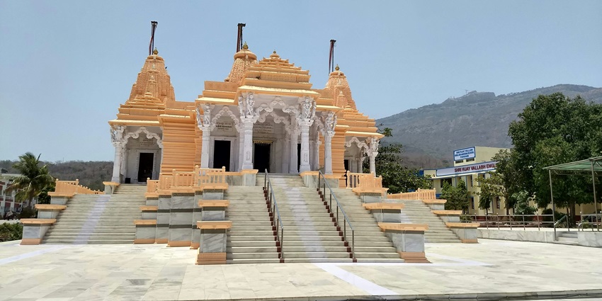 Seek divine blessings in the temple while enjoying scenic views at Pokhara Mahendra Gufa.