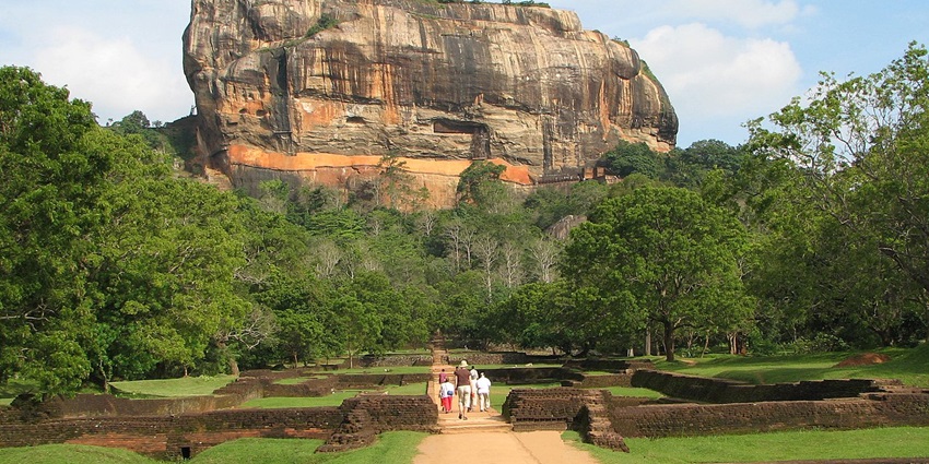 A serene view of the Sigiriya Rock Fortress showcasing grandeur and scenic beauty.