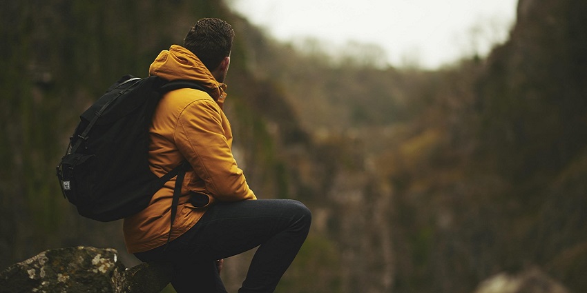 Image of man on trek similar to Singalila Trek, a route for trekking in North East