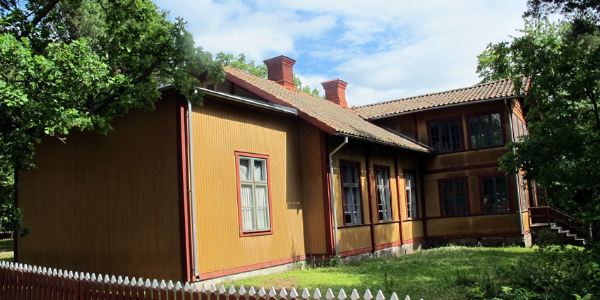 Brown-coloured fences around the Skansen Museum, an open-air museum and zoo in Skansen.
