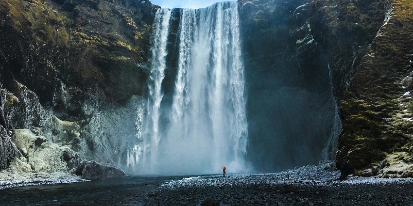 A breathtaking Icelandic waterfall where rainbows often form in the misty spray.