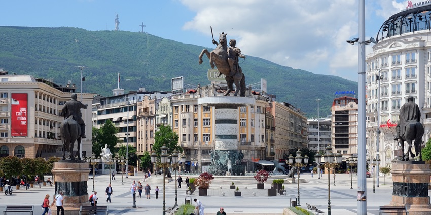 An image of Skopje, a top place to visit in North Macedonia, showcasing the Stone Bridge and Macedonia Square.