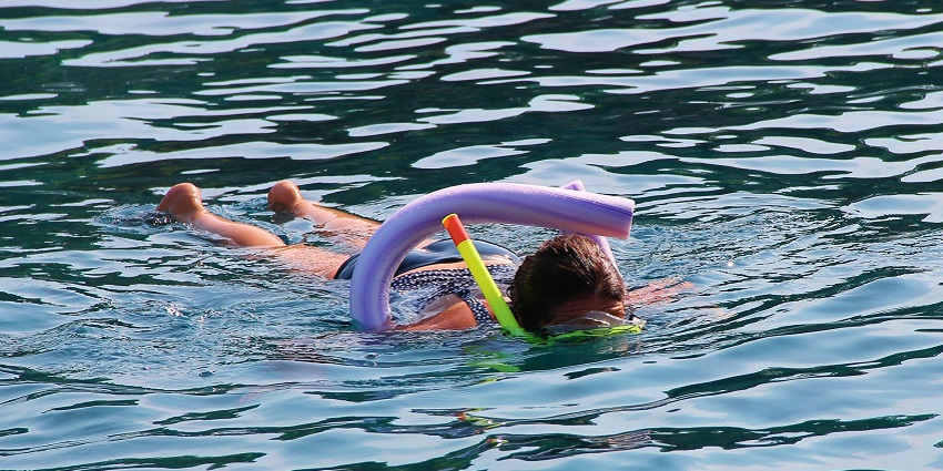 An image of a girl snorkelling, one of the best things to do in Negril, Jamaica.