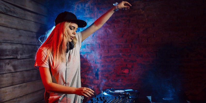 An image showing a female DJ performing in Soi Green Mango.