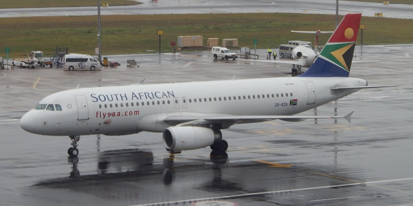South African Airlines aeroplane parked at Soyo airport, one of the airports in Angola.
