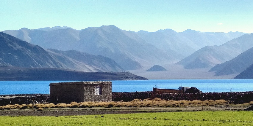 The picture showcases the beautiful Spangmik Village near the Pangong Lake