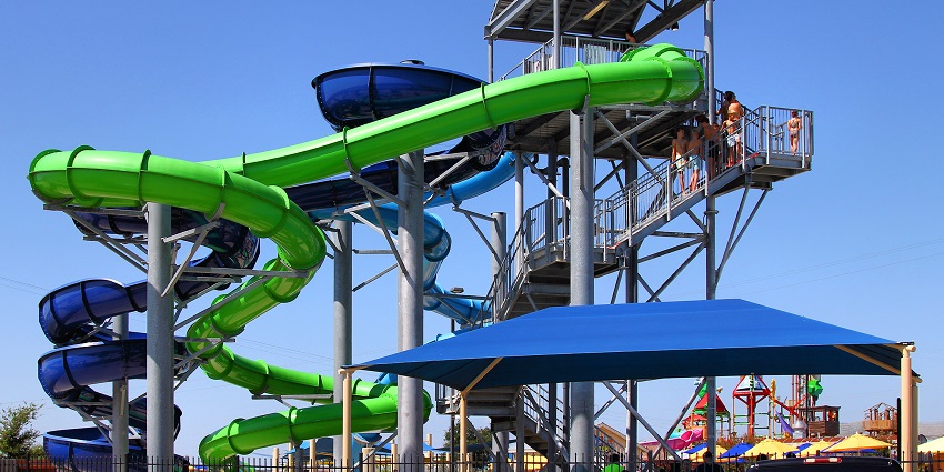 A wave pool at Typhoon Water Park, packed with visitors enjoying water rides