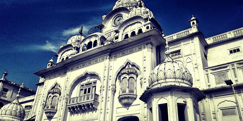The architectural masterpiece is decorated with numerous domes and arched windows.