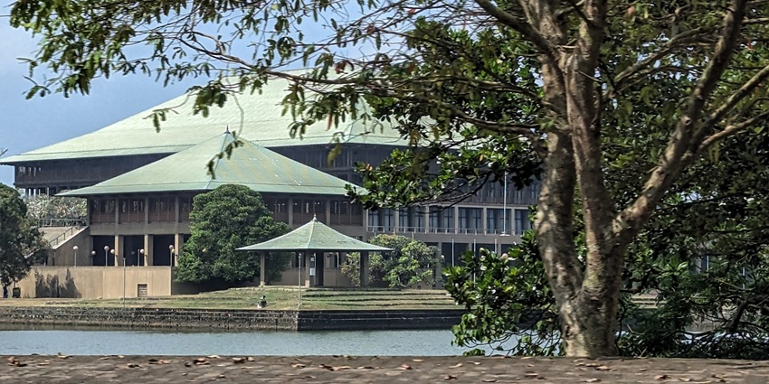 View of the Sri Lankan Parliament Complex surrounded by the tranquil waters.