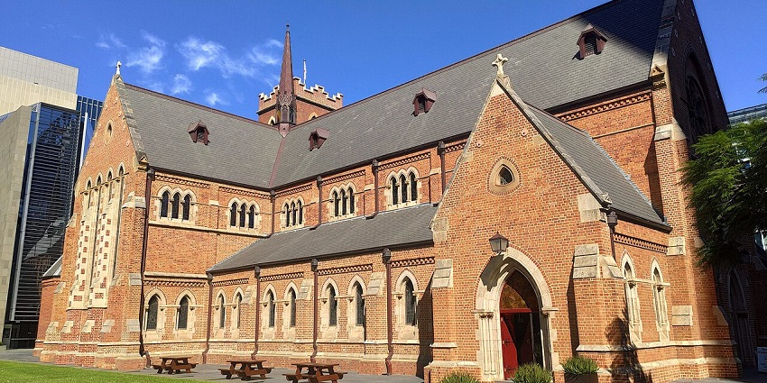 St. George’s Cathedral, one of the churches in Australia, features red brick walls and striking Gothic architecture.