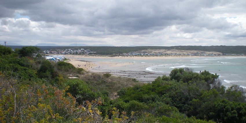 An image showing Stilbaai, the best place near Blombos Cave, viewed from the harbour.