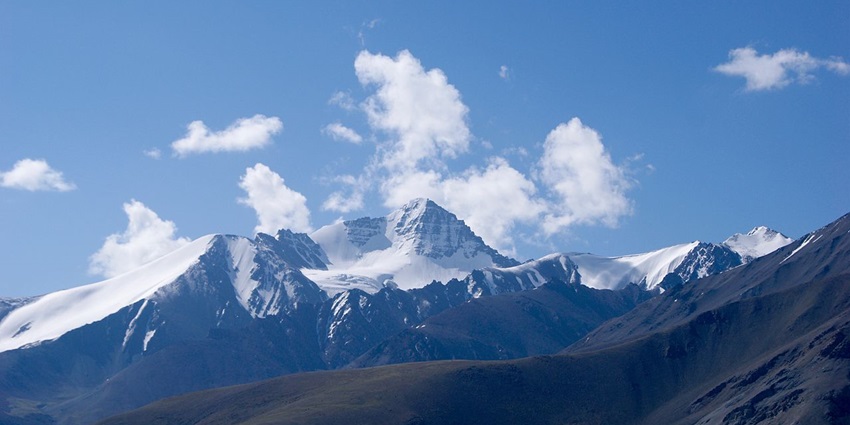 Trekkers climbing towards the Stok Kangri summit in Ladakh.