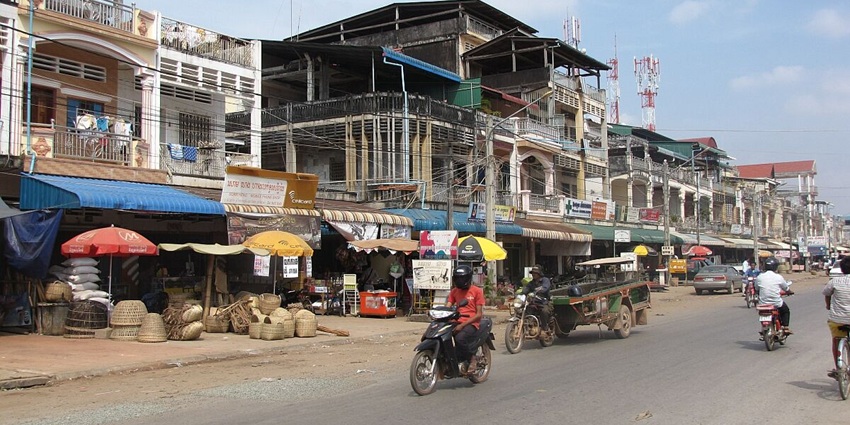 An image of people exploring the Kampot Town, a famous thing to do in Kampot.
