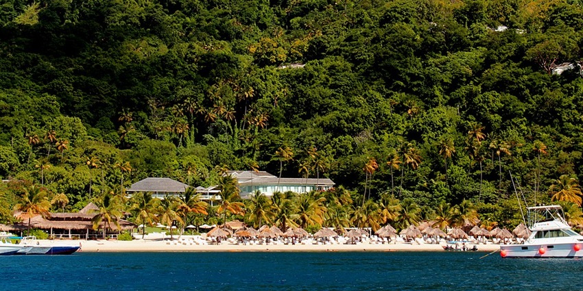 Sugar Beach, St. Lucia with white sands, volcanic peaks, and stunning Piton mountain views
