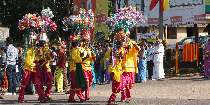 An image showing performers in traditional attire, among the list of tribal festivals in India.