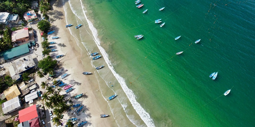 Crystal clear waters of the Secret Beach in Mirissa offering an escape to all nature lovers