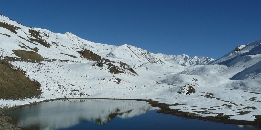A scenic view of Suraj Tal, a serene place to explore near Chandratal Lake in winter.