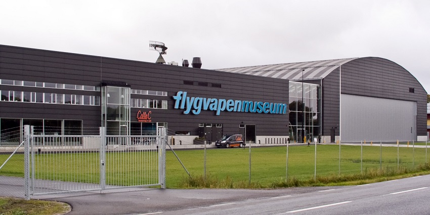 An image of the Flygvapenmuseum Museum, a modern design with large windows and panels.