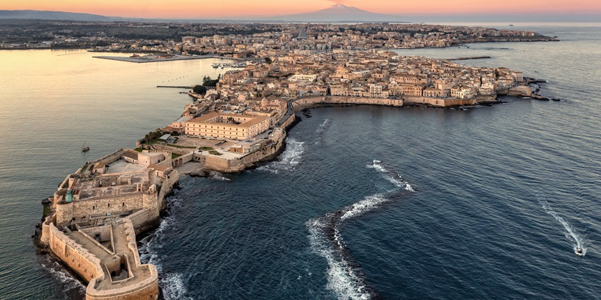 Discover ancient Greek ruins, baroque architecture, and charming coastal views in Sicily.