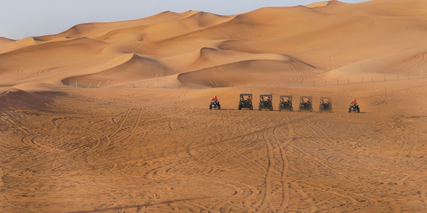 Feel the adrenaline rush as you navigate rugged dunes on a thrilling quad biking adventure.