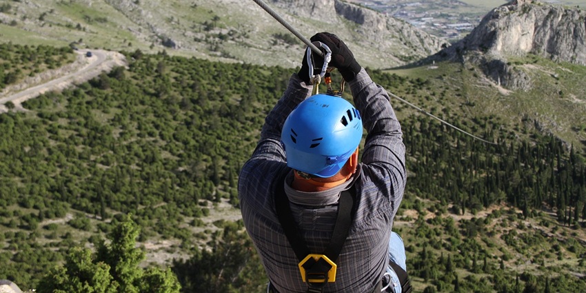 An image of a person zip lining in Falmouth, one of the best things to do in Jamaica