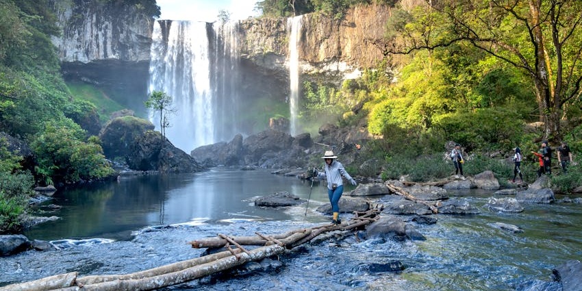 A large waterfall cascading over the rocks, one of the best trails for hiking in Goa.