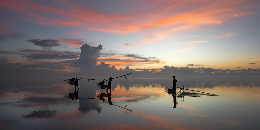 An image of Tansa Lake with surrounding forests and calm waters.