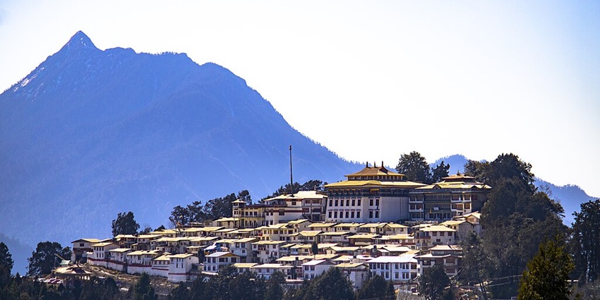 An image of the exterior view of a Tawang monastery with traditional Tibetan architecture.