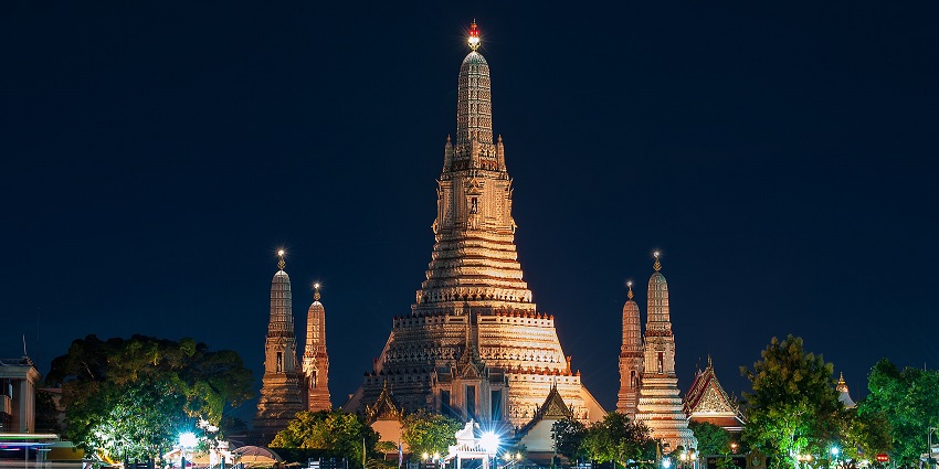 Wat Arun, a Bangkok temple with a porcelain-adorned tower.