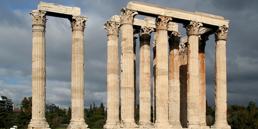 Ancient Corinthian columns of the Temple of Olympian Zeus are standing in Athens.