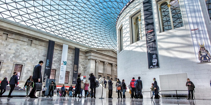 The British Museum, with its neoclassical facade and a peaceful atmosphere surrounding the entrance.