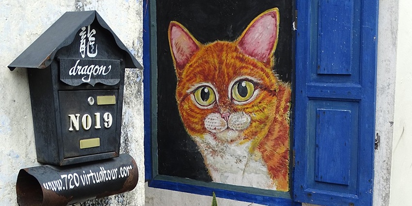 A charming cat mural raising awareness about Penang’s stray animals