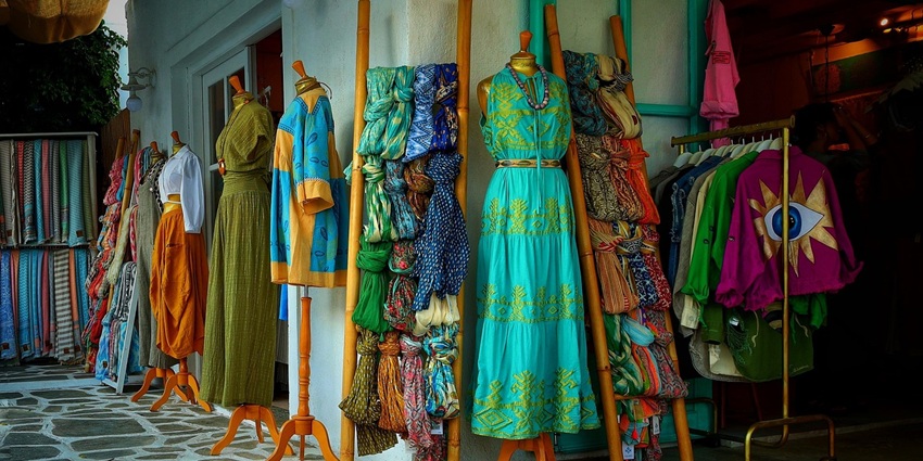An image showing clothes and fashion items in a small boutique, like The Old Biscuit Mill.