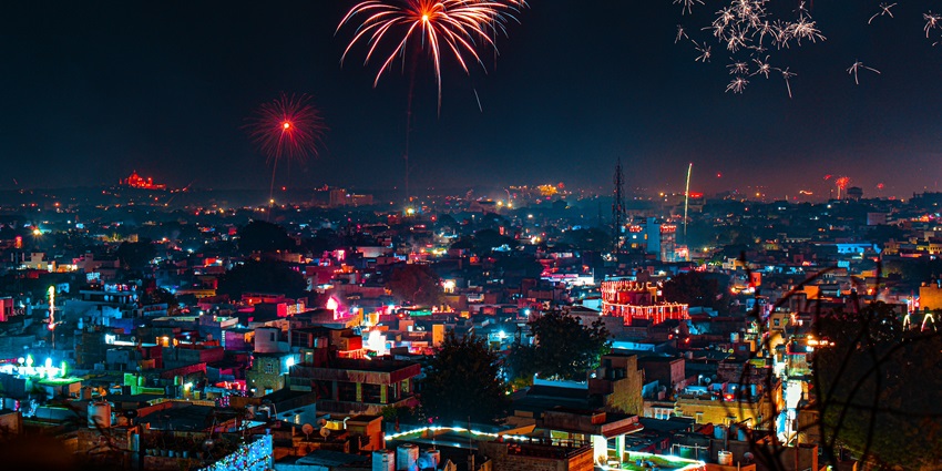 A nighttime view of Bali in Indonesia blessed with a quaint town decorated with lights.