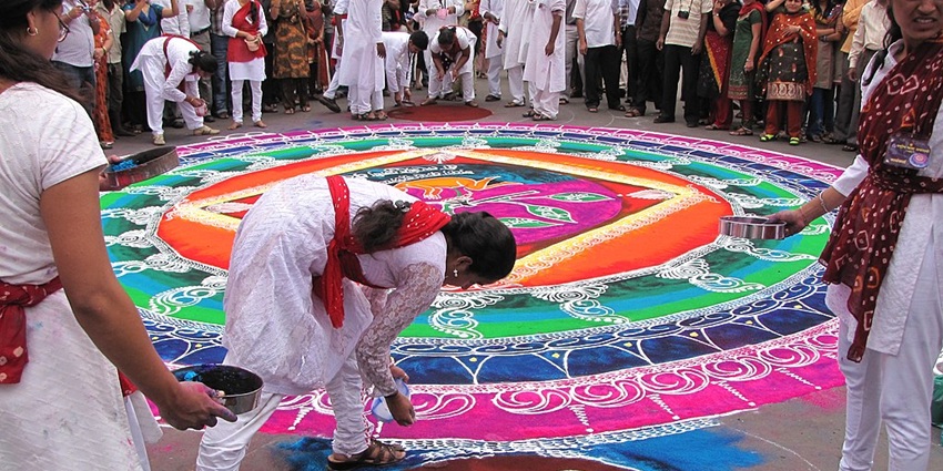 Preparation of a flower rangoli before the procession of Gudi Padwa in Maharashtra.