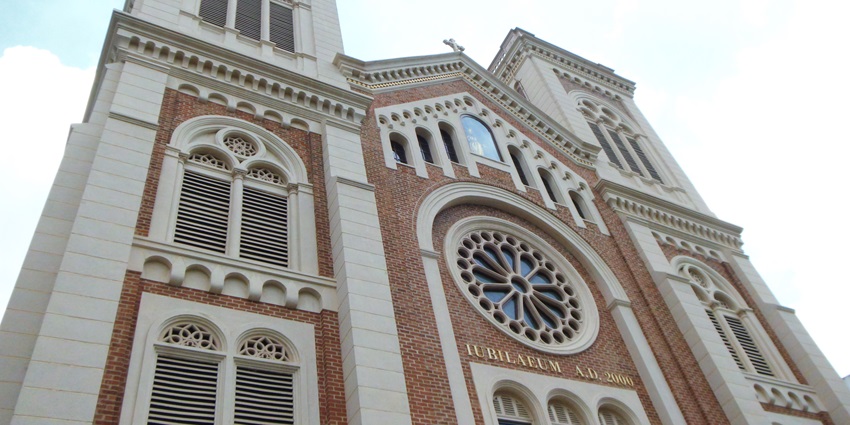A picture of Assumption Cathedral’s stunning stained-glass windows and elegant interior.
