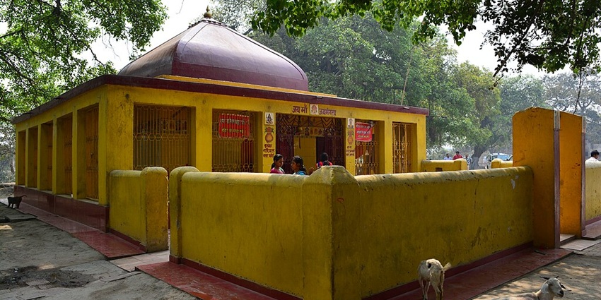 An image of The ornate architecture and sacred pond at Thiruppullani Temple.