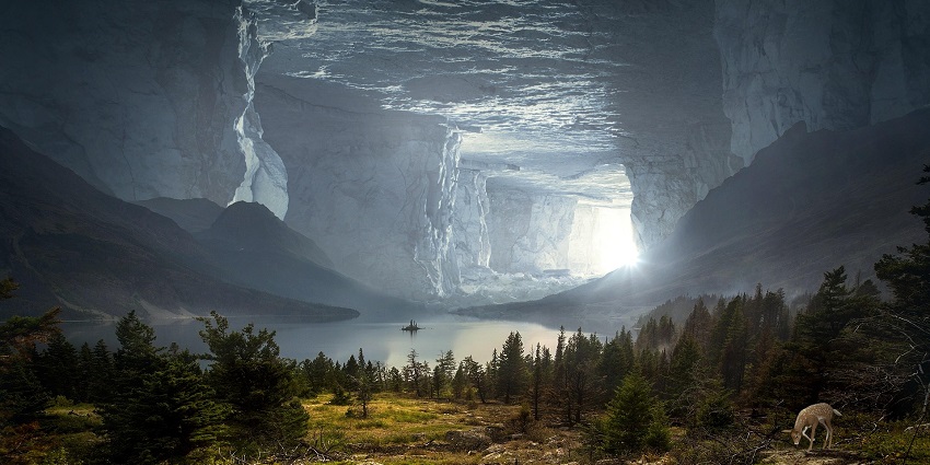 A cave with a large entrance, similar to Tien Ong Cave, featuring rock formations.