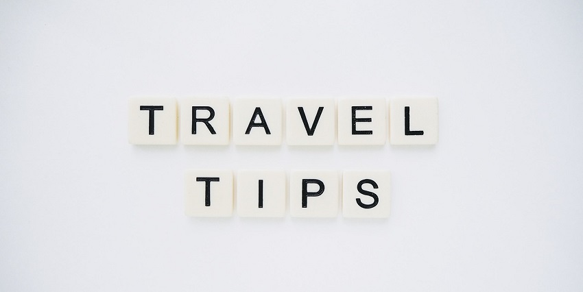 An image spelling 'TRAVEL TIPS' on background, suggesting helpful advice for travellers