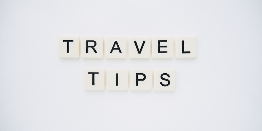 An image spelling 'TRAVEL TIPS' on background, suggesting helpful advice for travellers