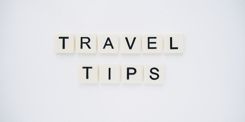 An image spelling 'TRAVEL TIPS' on background, suggesting helpful advice for travellers