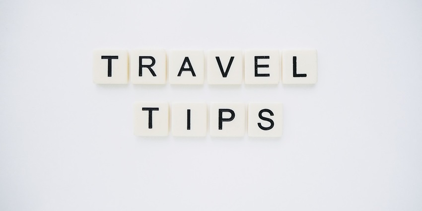 An image spelling 'TRAVEL TIPS' on background, suggesting helpful advice for travellers