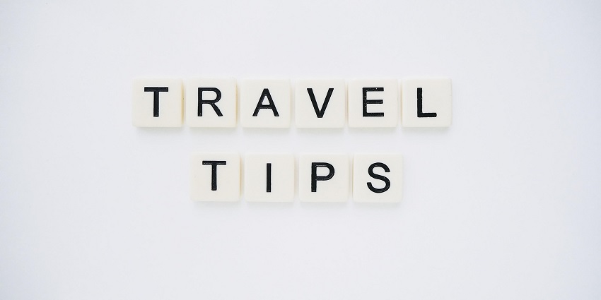 An image spelling 'TRAVEL TIPS' on background, suggesting helpful advice for travellers