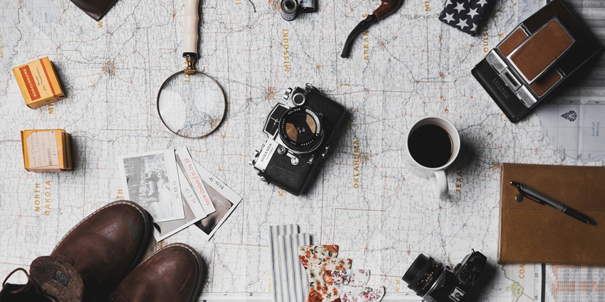 An image of travel items necessary for any trip for a seamless experience.