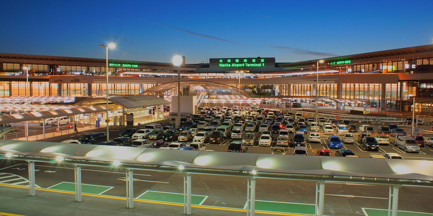 A night view of the parking area at Tokyo Narita International Airport in Japan.