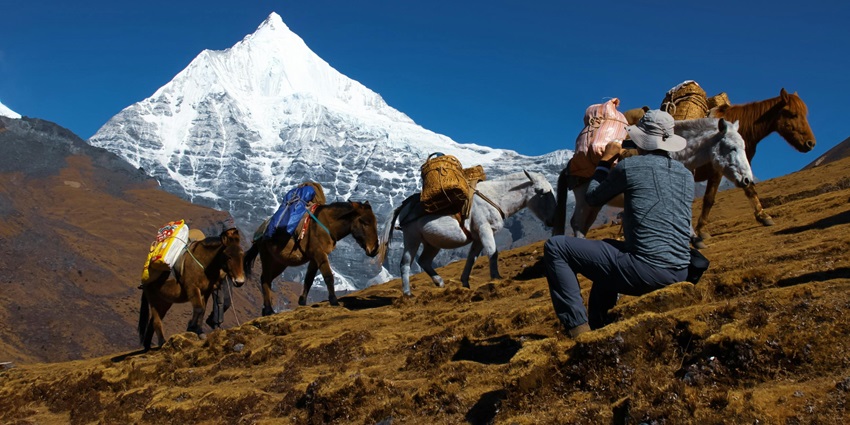 A glimpse of the Samtengang Winter Trek trail with mountain views and forested hills in Bhutan.