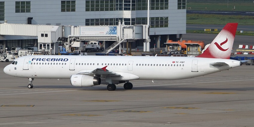 A Freebird Airlines aircraft is taxiing on the tarmac at one of the airports in Botswana.